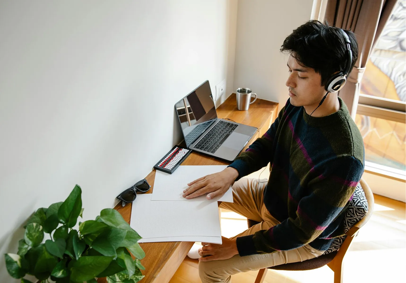 A person using accessible technology at home